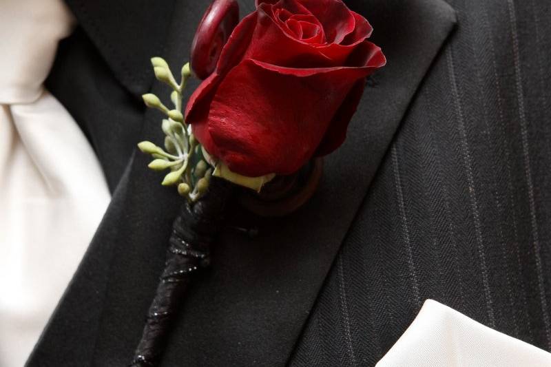 Ceremony location with deep red aisle runner.