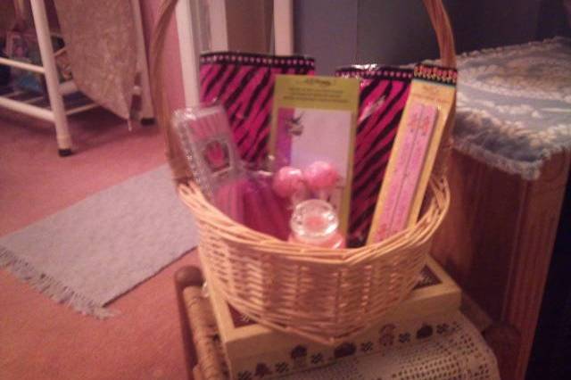 Memory Bag contents for a Pink and Zebra Print themed birthday party.  All items were placed in a themed party bag and given to each guest