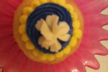 Swirled Flower with Dot bordered Birthday Cupcake