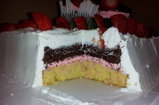View of a Strawberry Shortcake with Strawberry Creme filling once the cake was cut