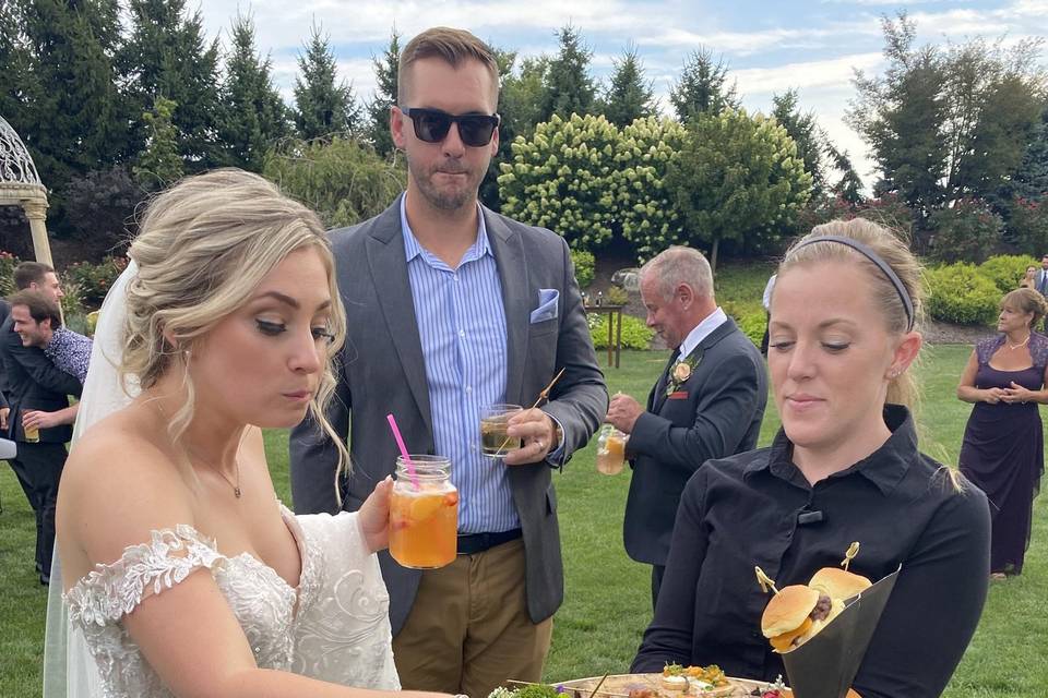 Bride enjoying food & drinks