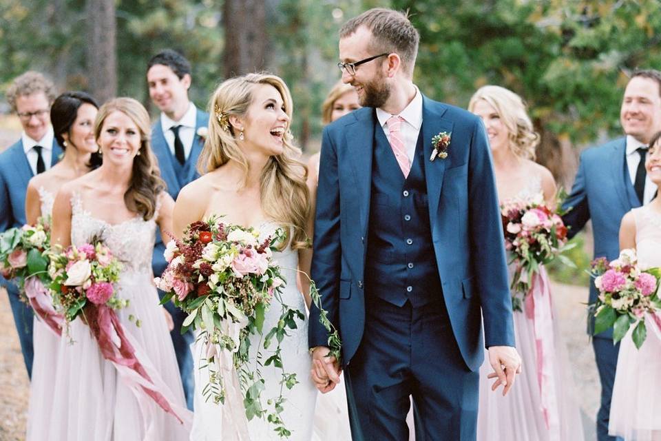 The couple with the bridesmaids and groomsmen