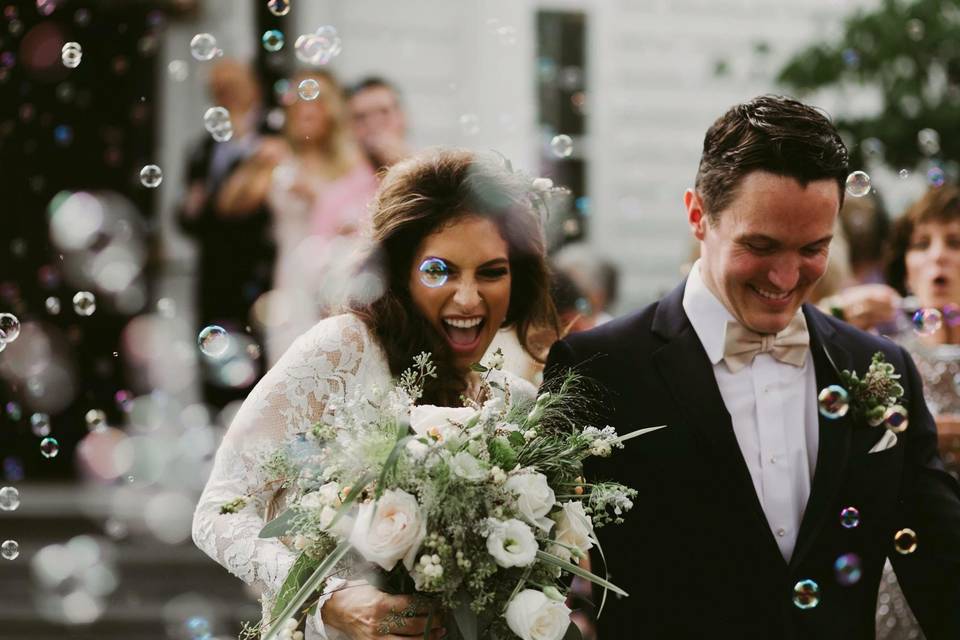 Bride and groom walk out