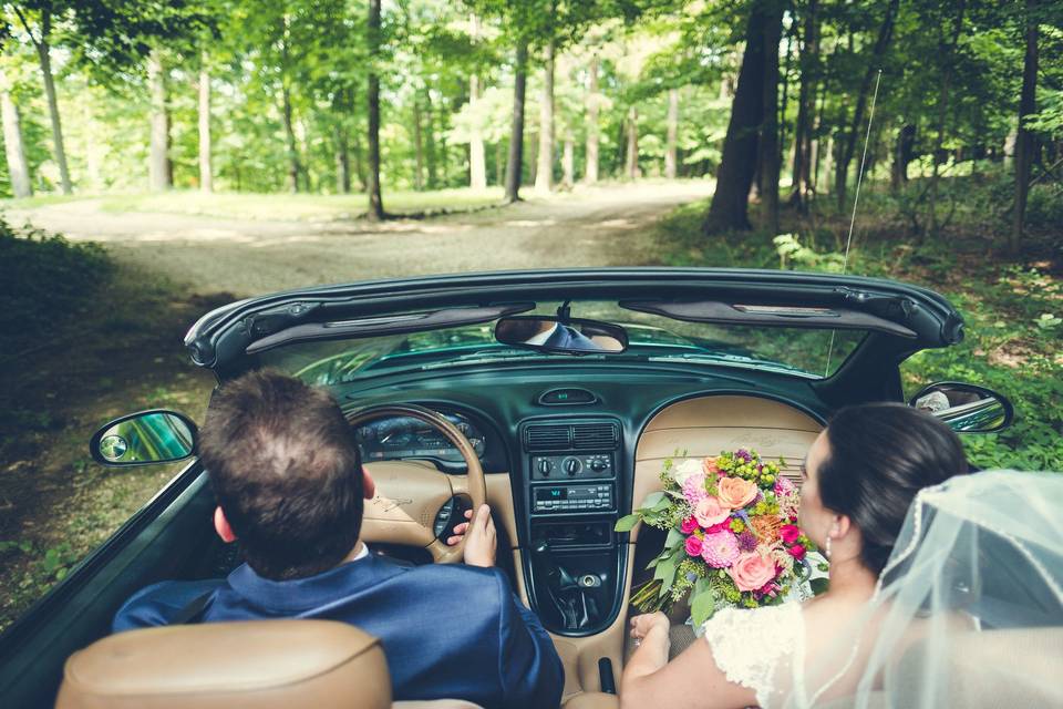 Bride and groom Drive off