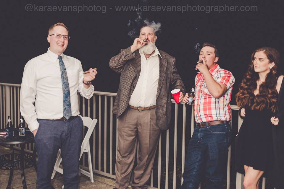 Wedding Guests Enjoying Cigars