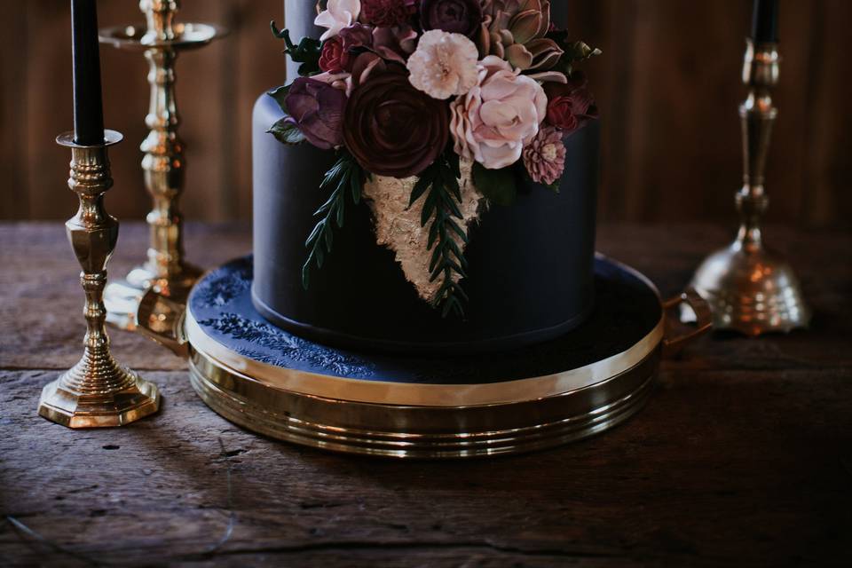 Cakes by Gina  This cake is a marble marvel A mixture of 2 marble colors  and metal pedestal makes this cake so unique SHARE with a fellow Bride to  be houstonweddings 