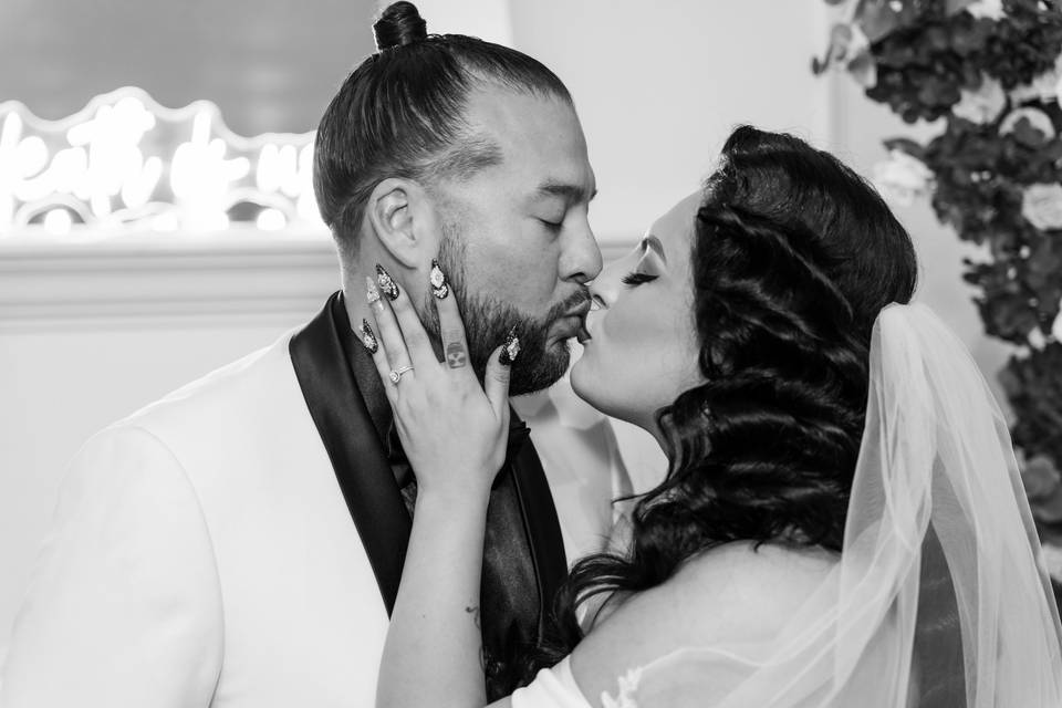 Bride and groom kissing