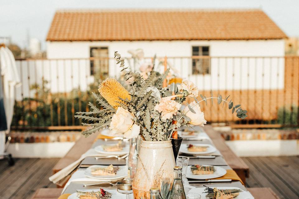 Table setting and floral centerpieces