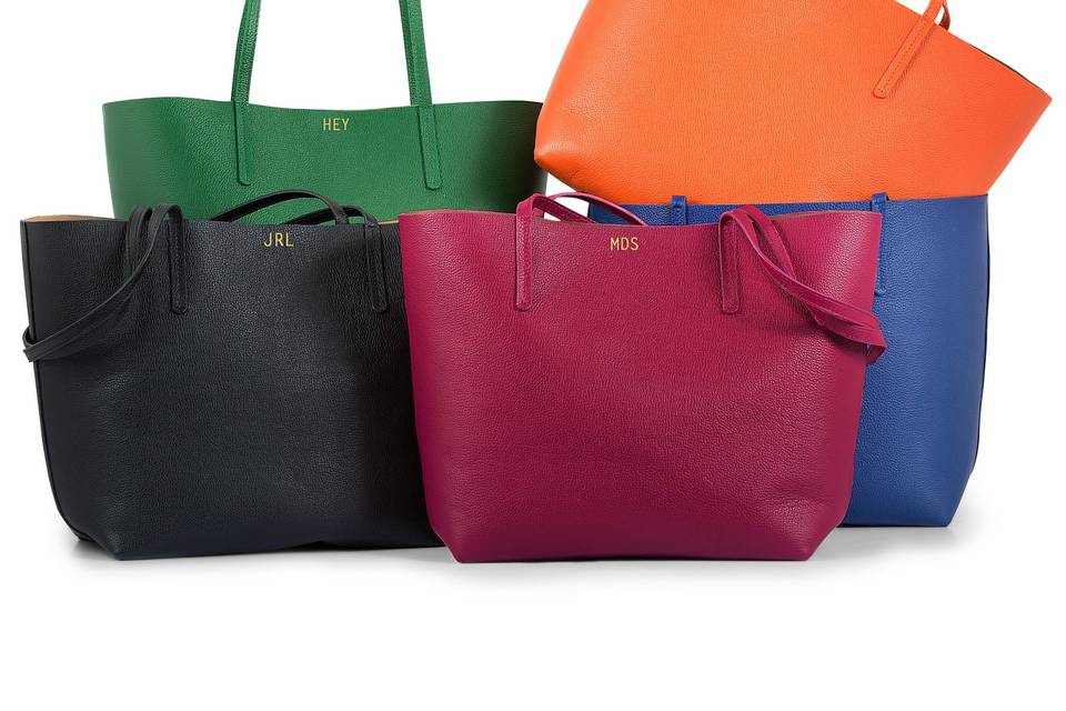 The perfect maid-of-honor gift: A colorful leather tote bag, personalized with her metallic initials