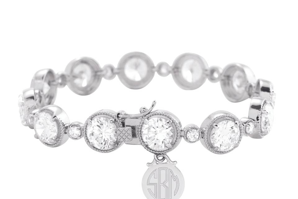 Something new: Personalize a bracelet with your new monogram for your trip down the aisle.