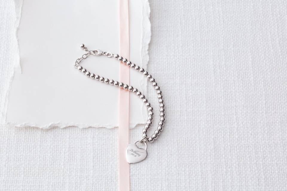 Personalize Mother-of-the-Bride gifts with a message from you, and she'll always cherish it.