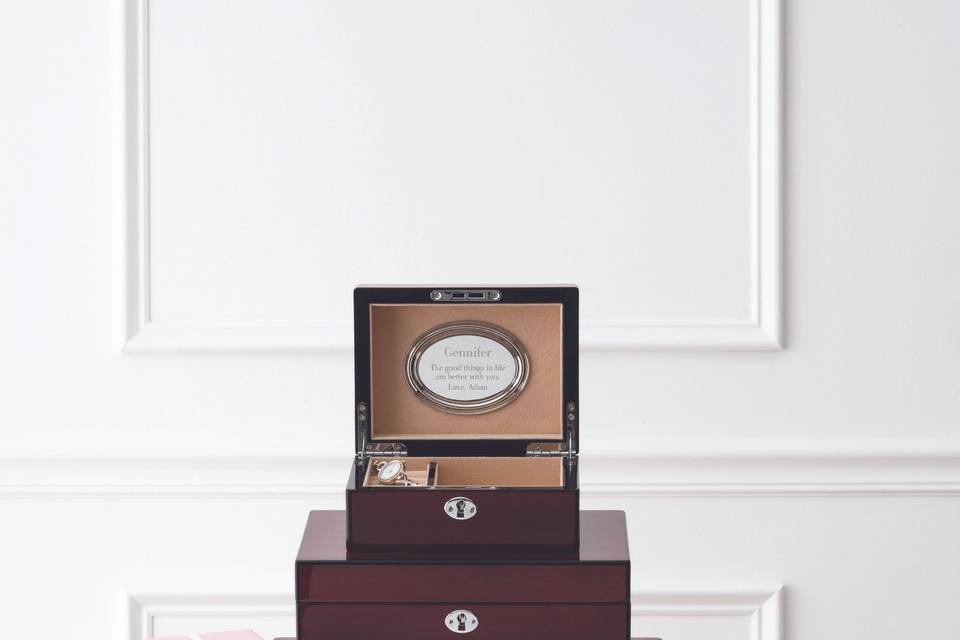 A perfect gift with their bridesmaid jewelry? A personalized jewelry box with a message from you.