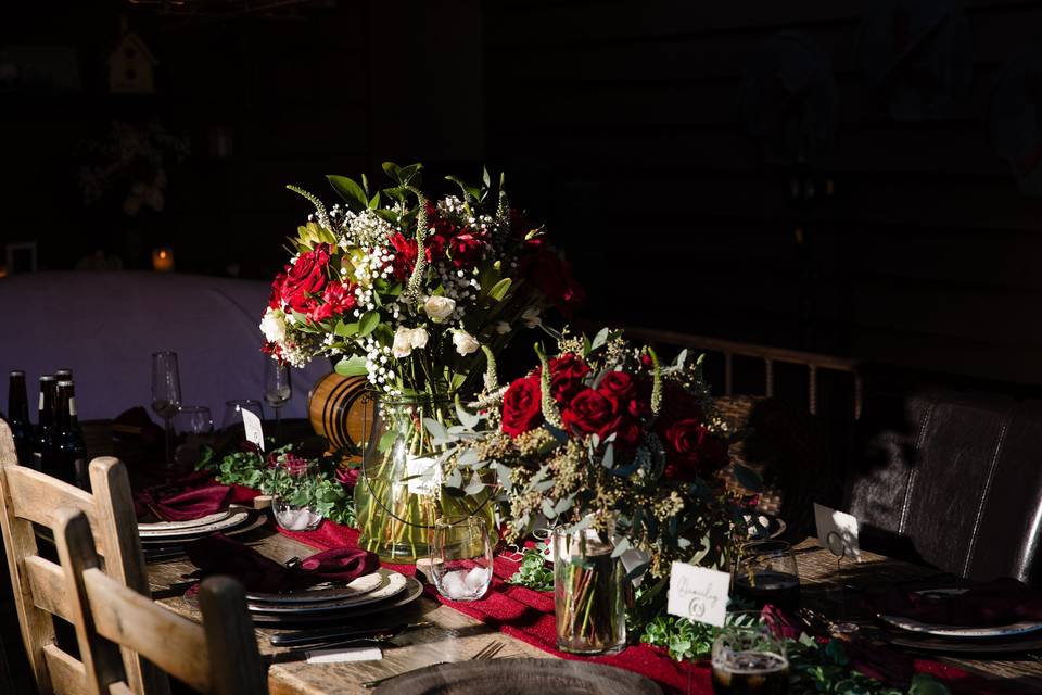 Red rose centerpieces by Kim