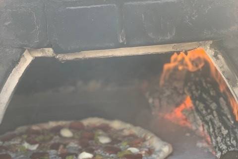 Pizza on oven