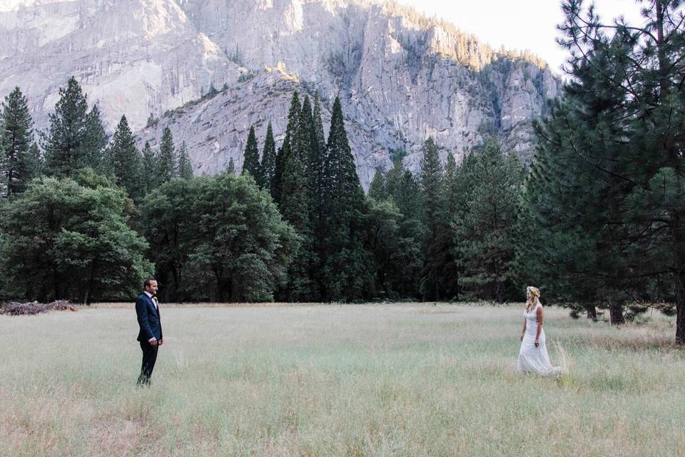 Couple in view of mountains at Yosemite park