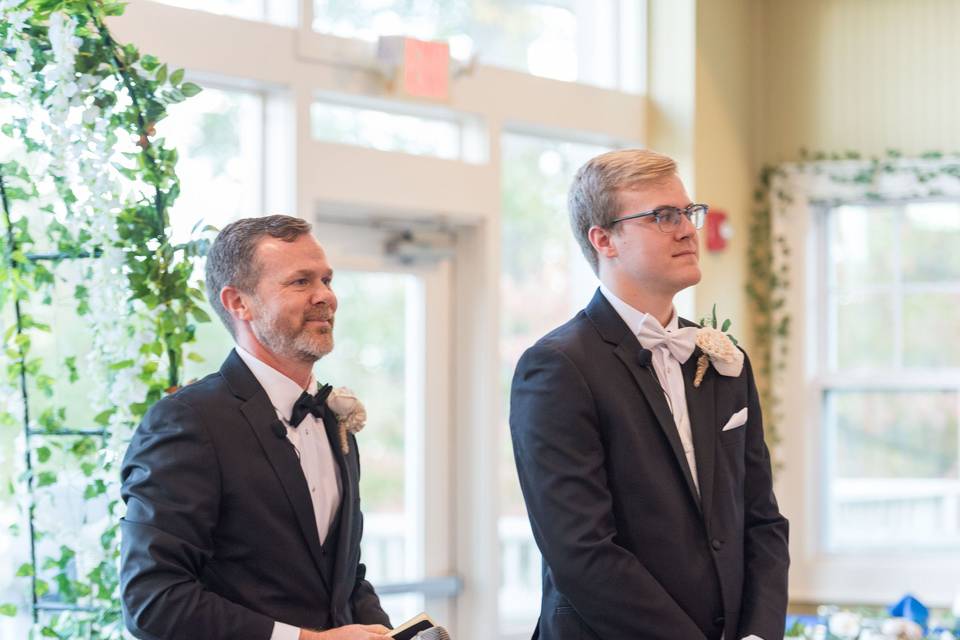 Seeing bride come down aisle
