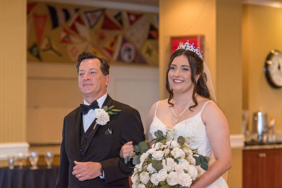 Bride escorted by father