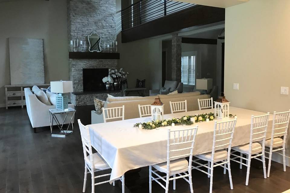 white chiavari chairs for an engagement party