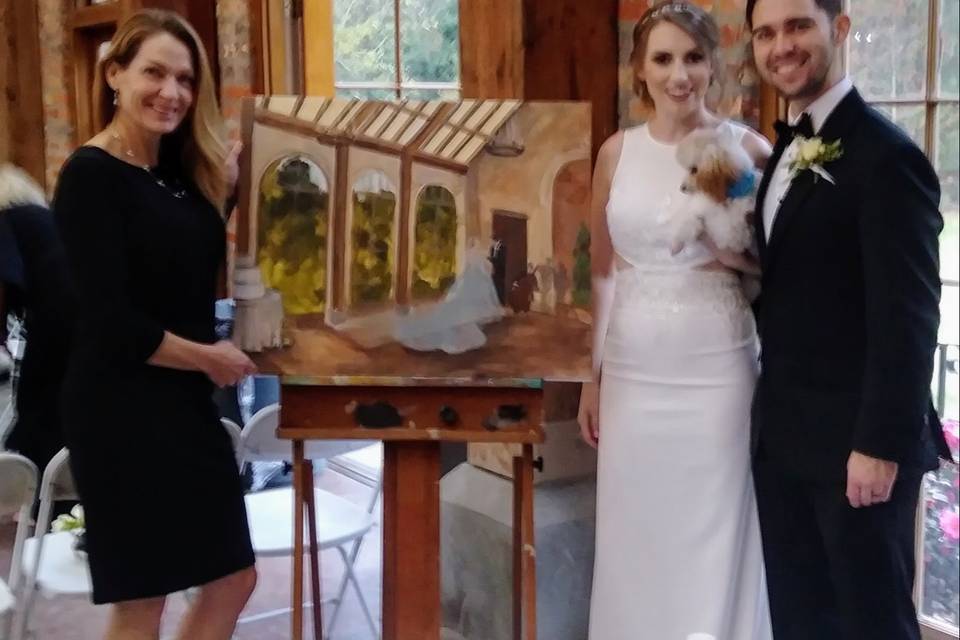 Mr. & Mrs. Lewis by their painting