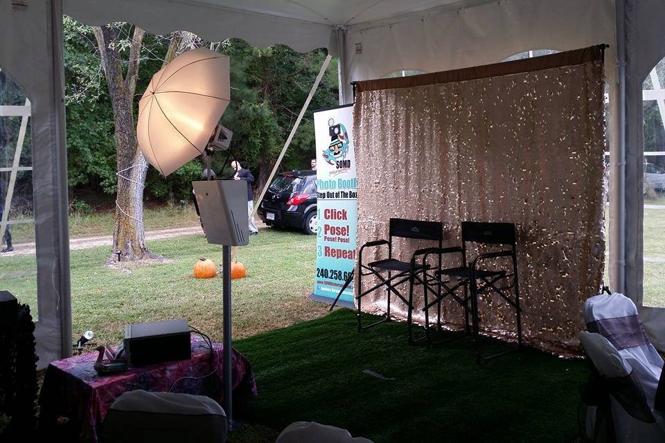 Booth backdrop and chairs