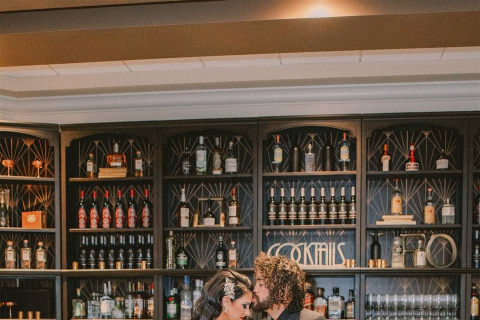 Kisses in front of the bar