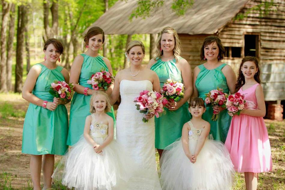 Bride with bridesmaids and flower girls