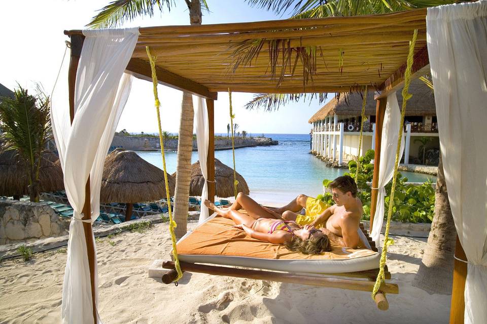 Relaxing on the beach - Journey to Paradise Travel & Tours