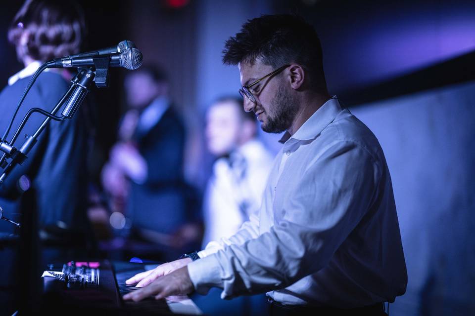Gino playing keyboard