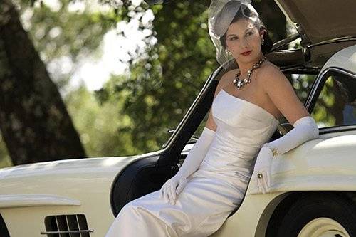 Laura Jayne hat with blusher & crystal design, Carolina Amato opera length silk gloves, Sorrelli vintage necklace.