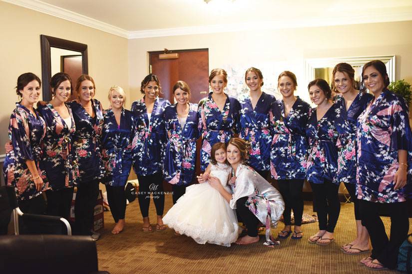 Bride, bridesmaids, and flower girl