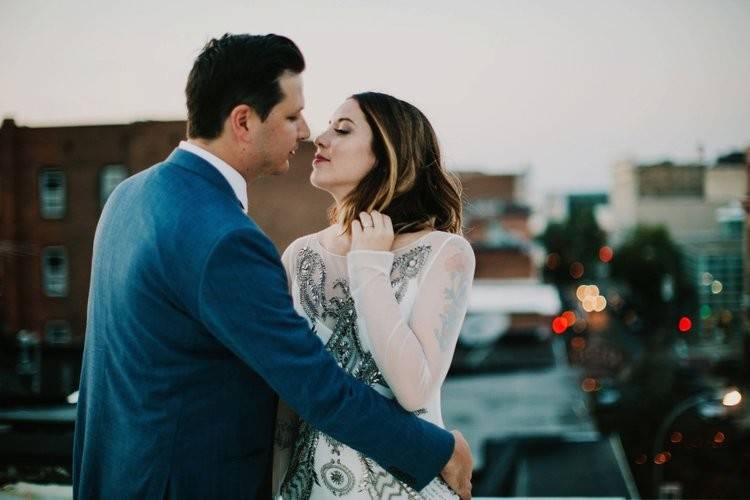 Groom and bride about to kiss