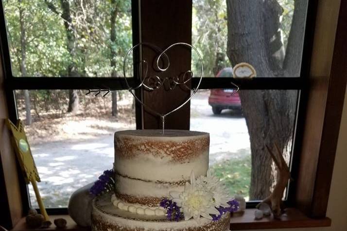 Naked cake with fresh flowers