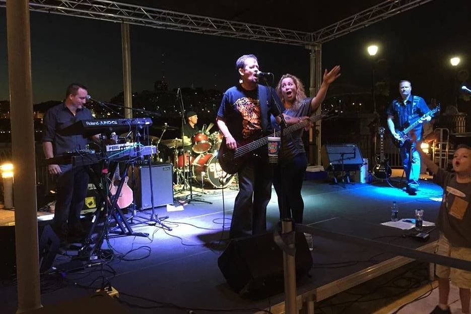 Strangelove Band performing onstage
