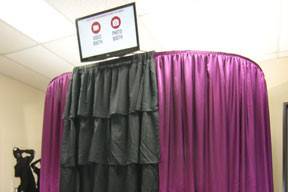 Our lovely purple booth!   We fit large groups!  Up to 10 adults.  Truly Unlimited prints!  Everyone gets a copy of their photos.The only booth with 