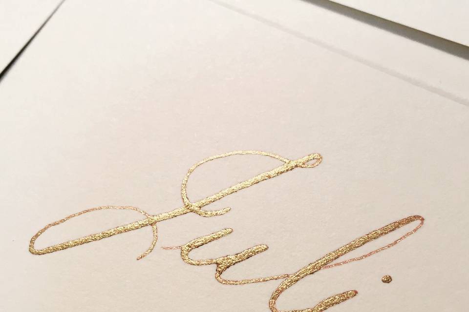 Gold pointed pen place cards