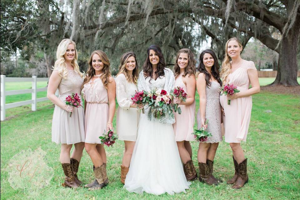 Bride with her bridesmaids in boots