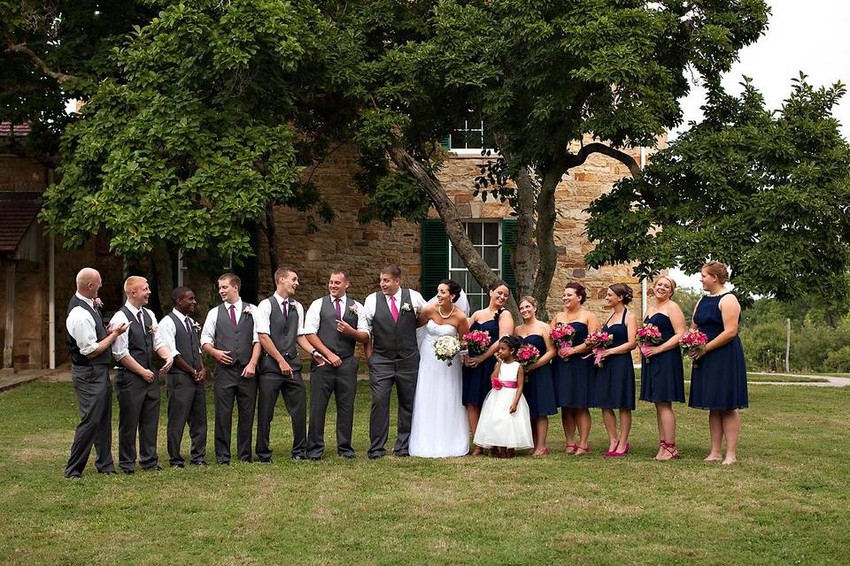 The bride with the bridesmaids and groomsmen