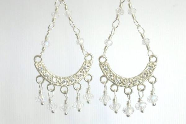 Chandelier earrings accented with
brilliant CZ stones.
Materials:  Cubic  zirconia,
sterling silver findings
Size:  3