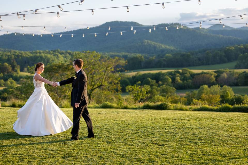 Couple dancing in a field