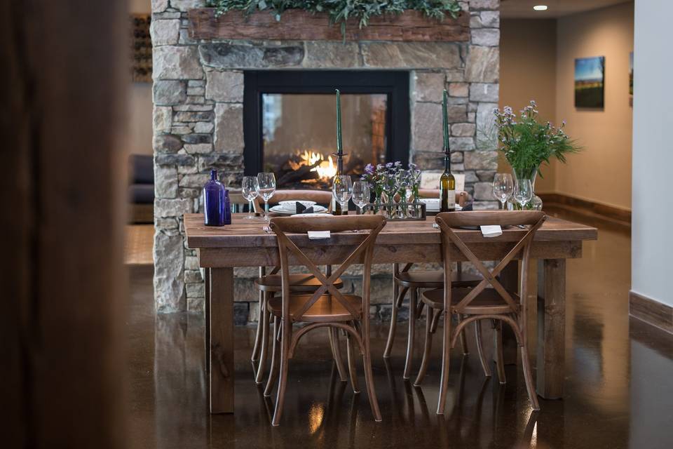 Dining table in front of  chimney