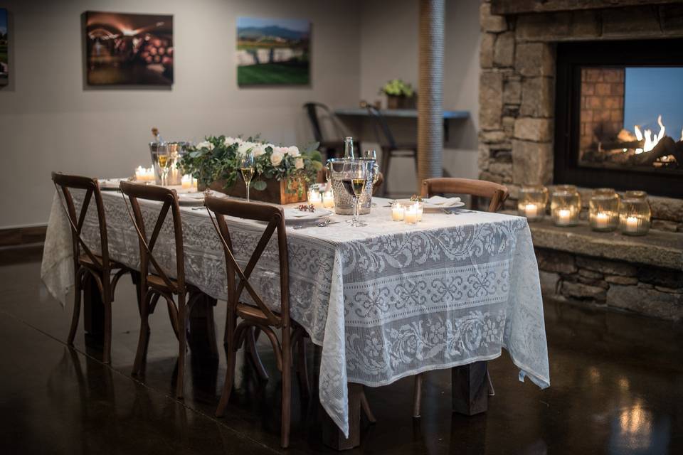 Dining table in front of chimney