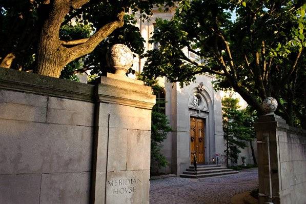 Meridian House is considered by many to be the finest example of French architecture in the United States.  Designed by architect John Russell Pope, Meridian is surrounded by elegant stone walls sheltering a grove of linden trees and lush gardens.  (Photo by Egomedia Photography)