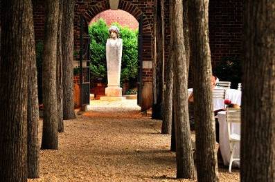 A grove of 80-year-old spanish linden trees provides a unique setting for cocktail receptions and ceremonies.  (Photo by Egomedia Photography)