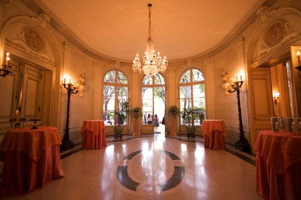 The Loggia is a beautiful oval sunroom that leads to the Linden Grove.  During favorable weather, the doors may be opened and guests move easily between the indoor and outdoor function areas.  (Photo by Stacey Vaeth Photography)