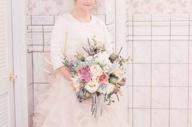 The bride holding bouquet