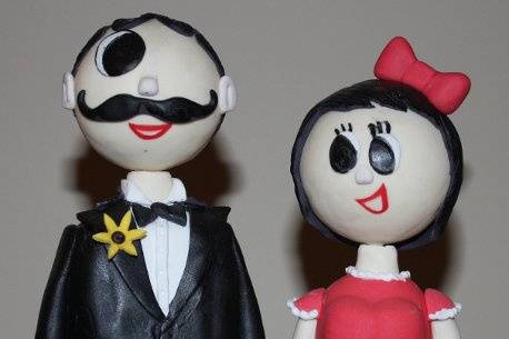 Baltimore’s iconic couple custom made from fondant.
