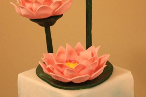 Custom made gum paste lotus cake topper.