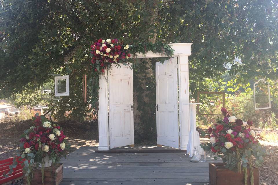 Shabby Chic rustic doors adorned with natural blooms