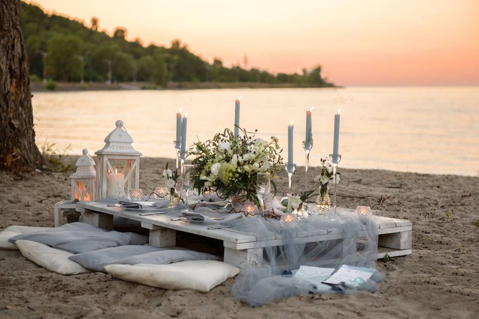 Sunset proposal beach dinner