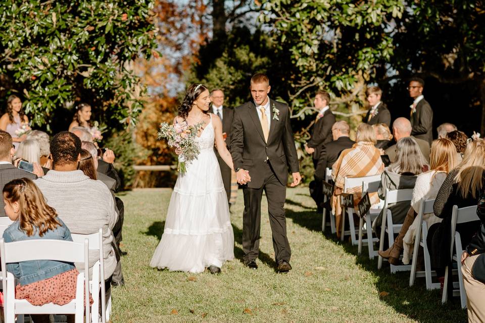 Ceremony by magnolia trees